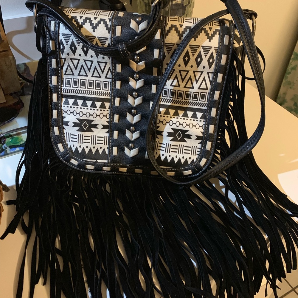 Women’s black and white aztec fringe purse